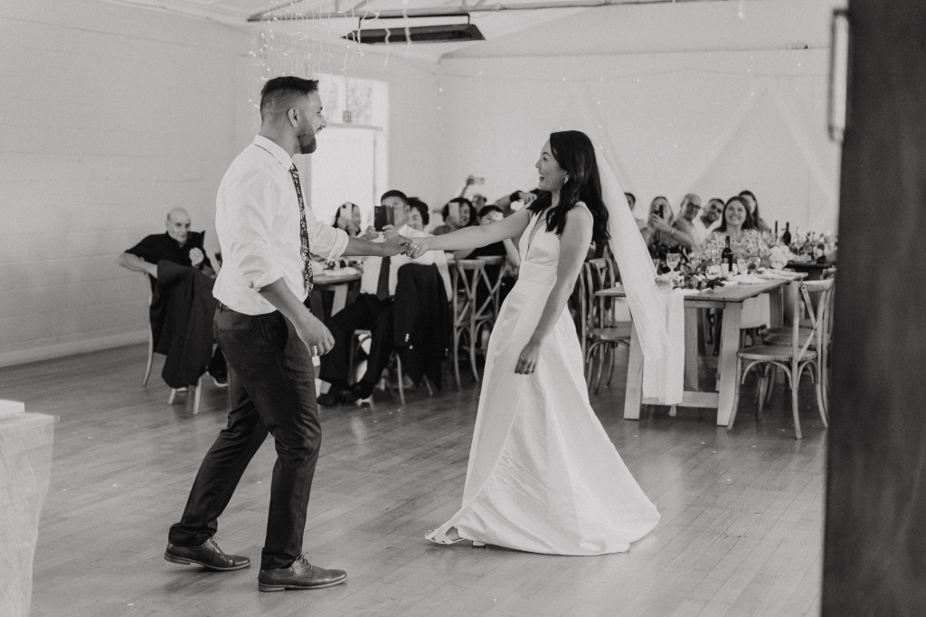 Auckland wedding photograper capturing a piha wedding dance